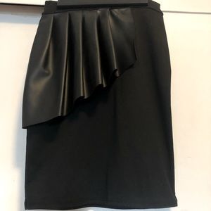 Peplum style skirt with faux leather detail